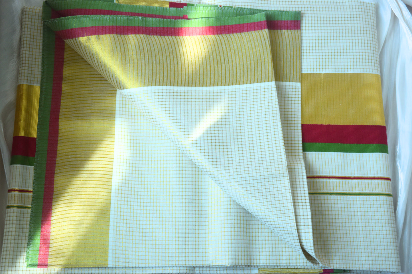 Kerala kasavu saree in ruby pink and green