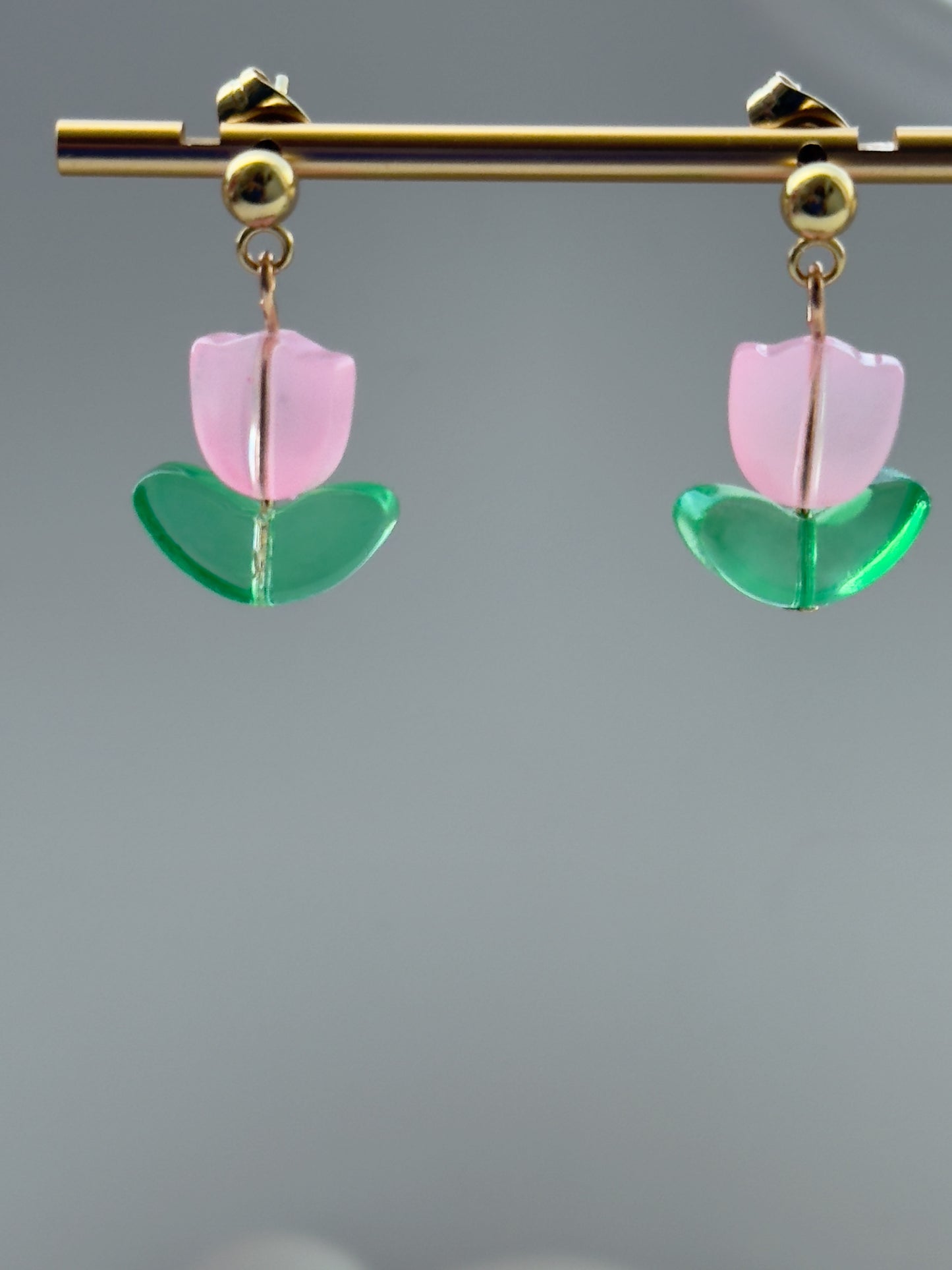 Expertly handcrafted and available in mesmerizing shades of pink, red, and blue, our Tulip Stud Earrings are the perfect addition to any outfit. Made with careful attention to detail, these statement pieces are sure to impress.
Expertly handcrafted and available in mesmerizing shades of pink, red, and blue, our Tulip Stud Earrings are the perfect addition to any outfit.