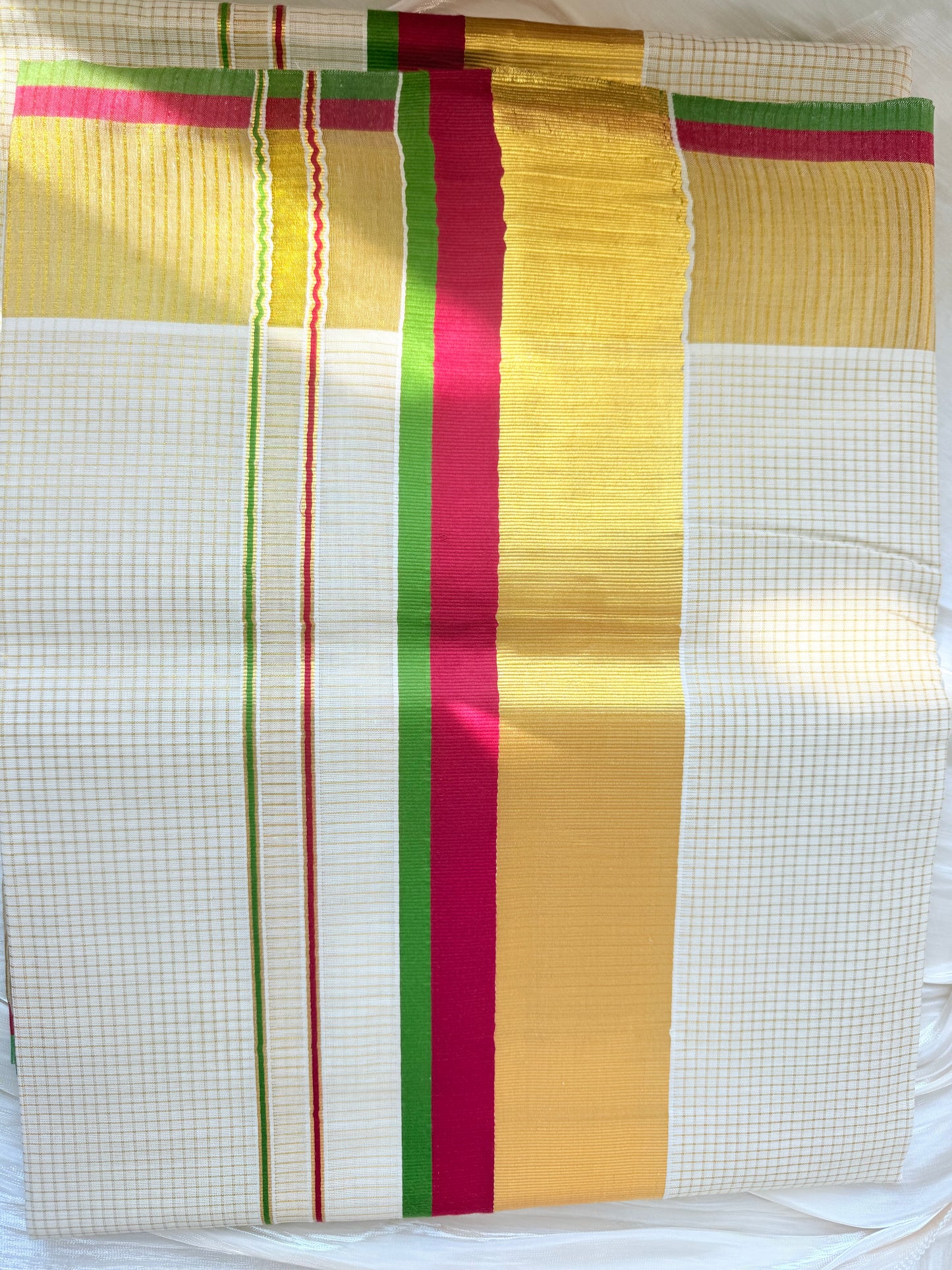 Kerala kasavu saree in ruby pink and green