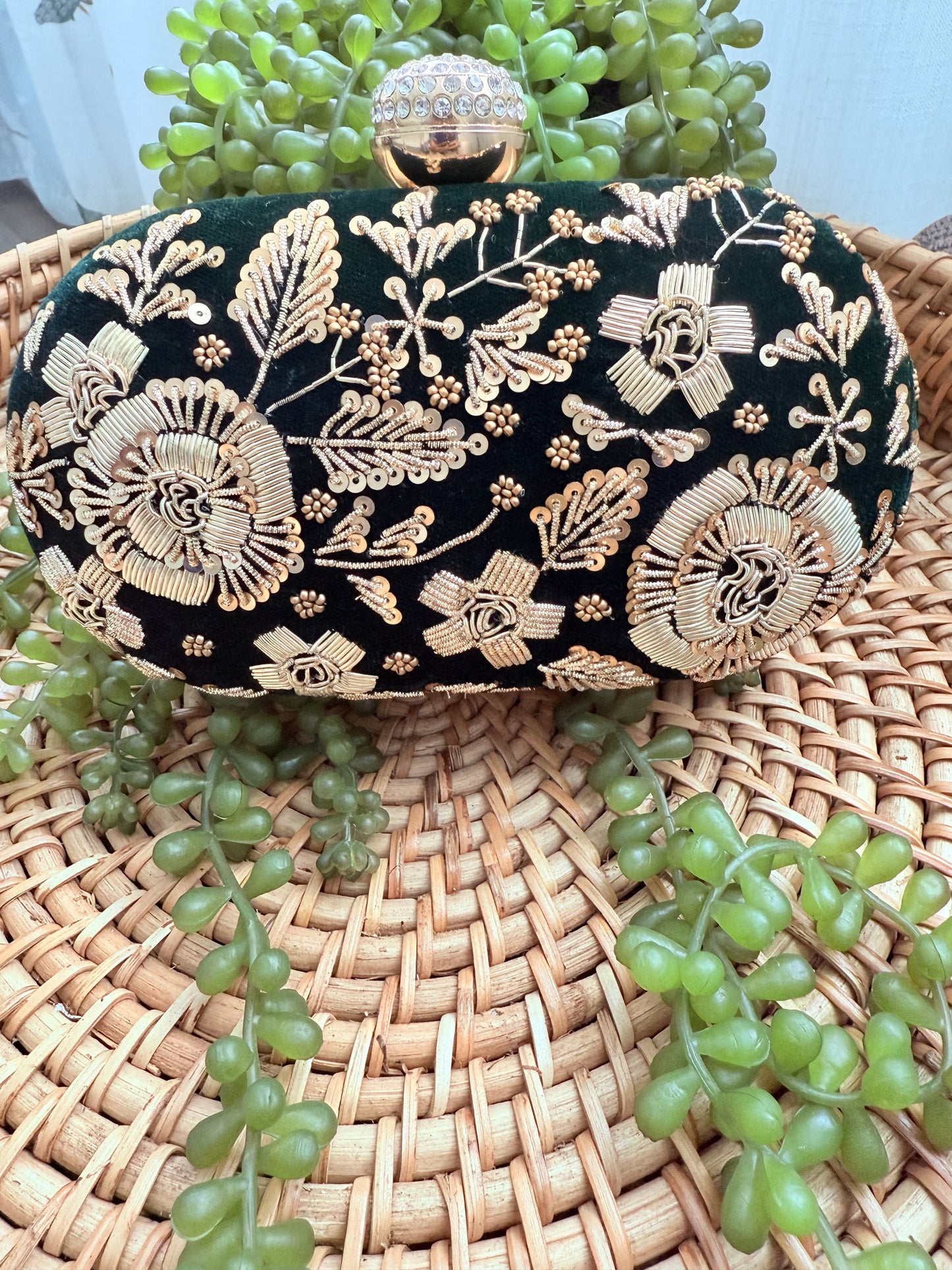 Bottle green clutch bag