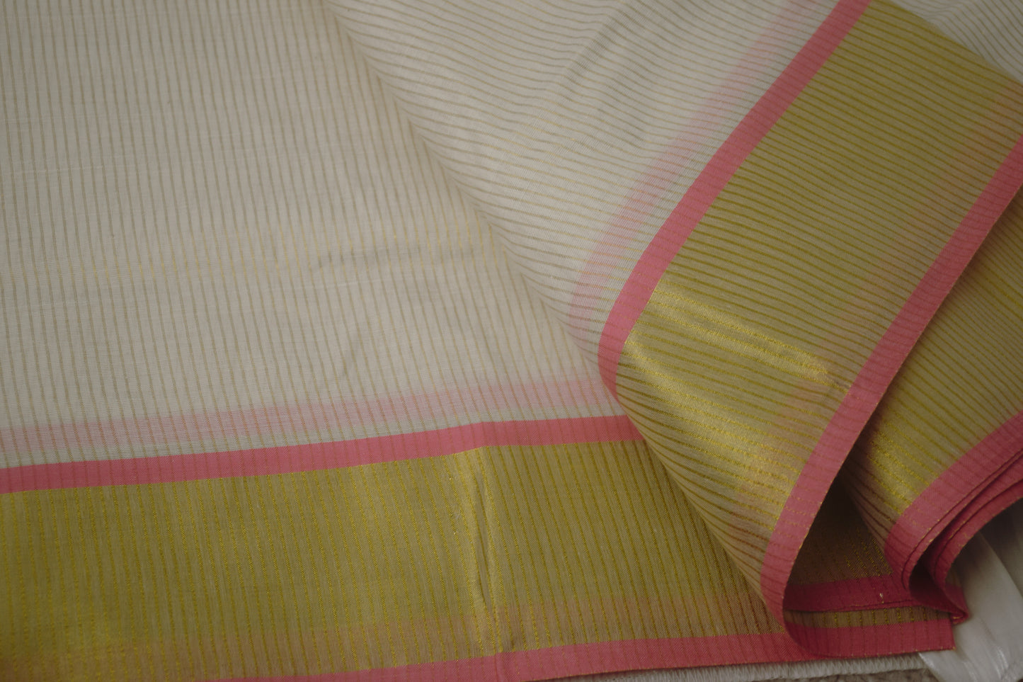 Traditional Kerala saree with pink border


