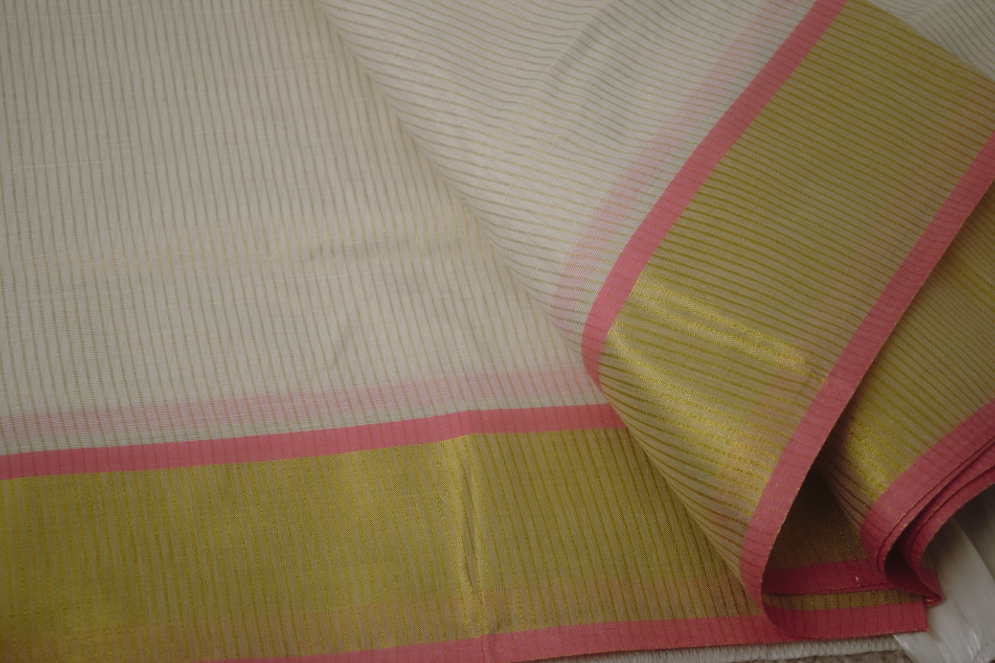 Traditional Kerala saree with pink border


