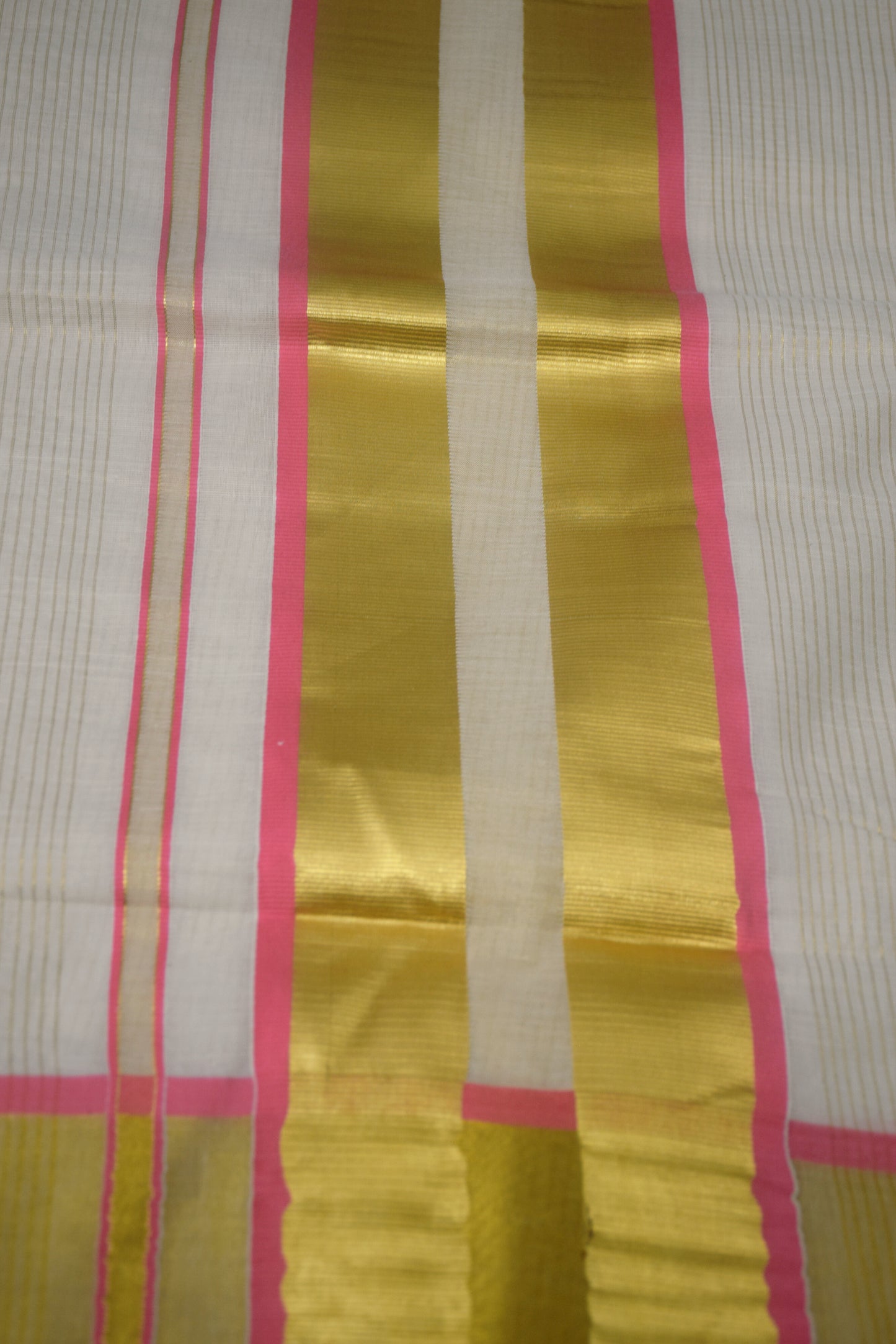 Traditional Kerala saree with pink border


