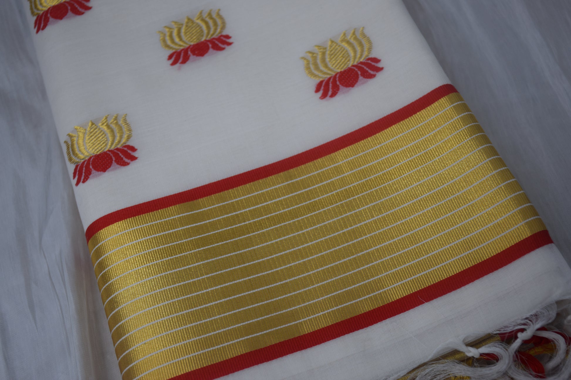 Kerala saree red black checked pattern