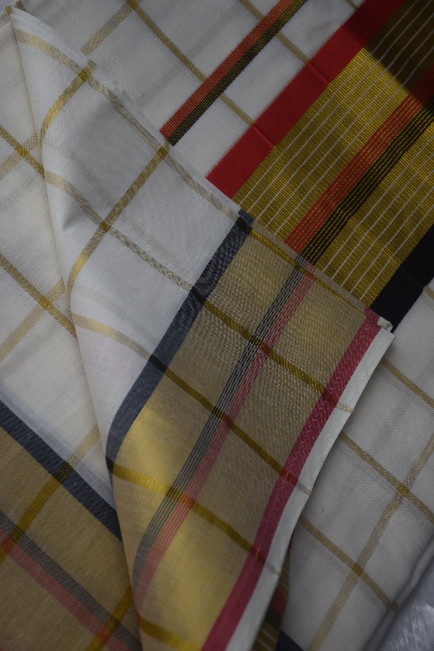 Kerala saree red black checked pattern