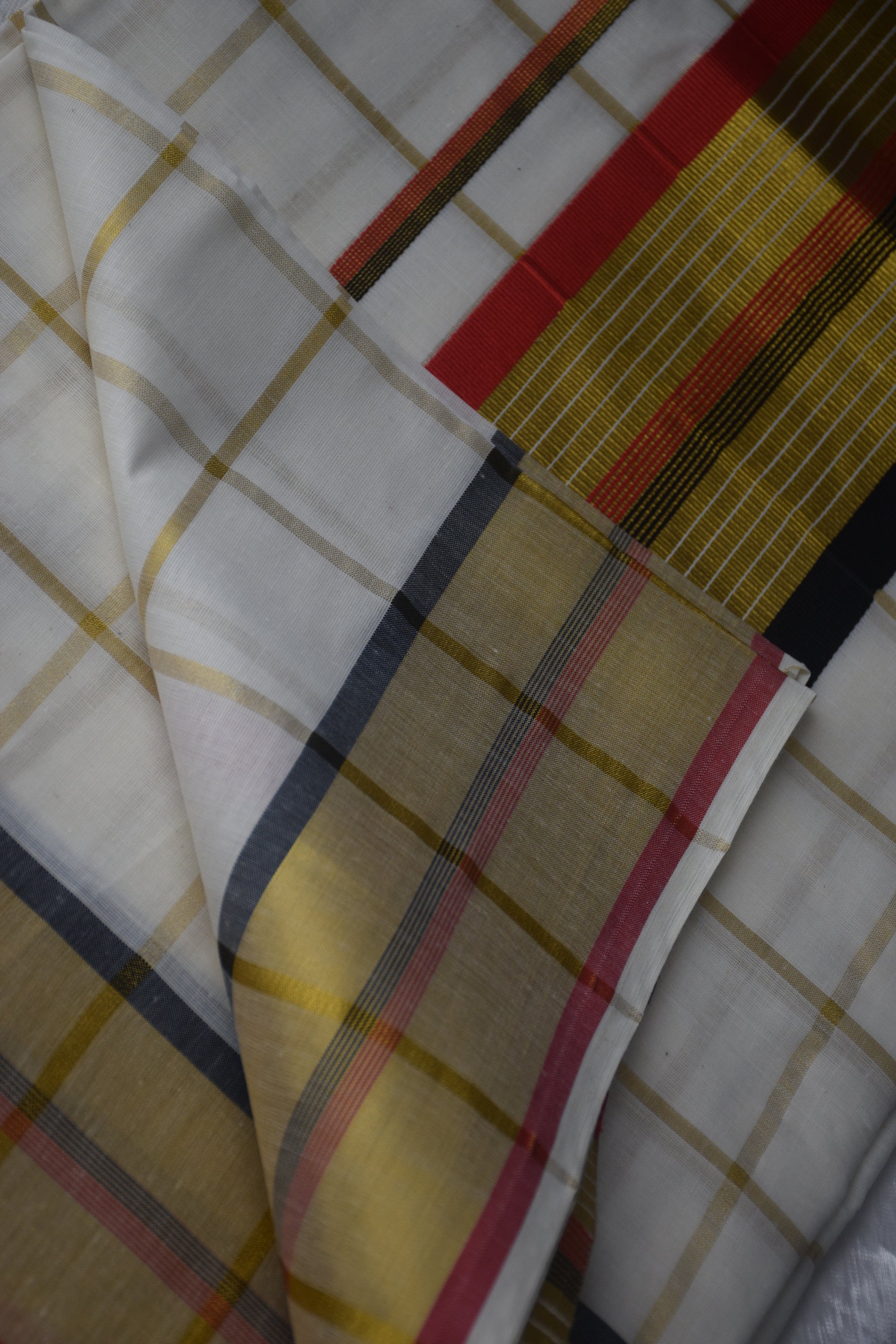 Kerala saree red black checked pattern