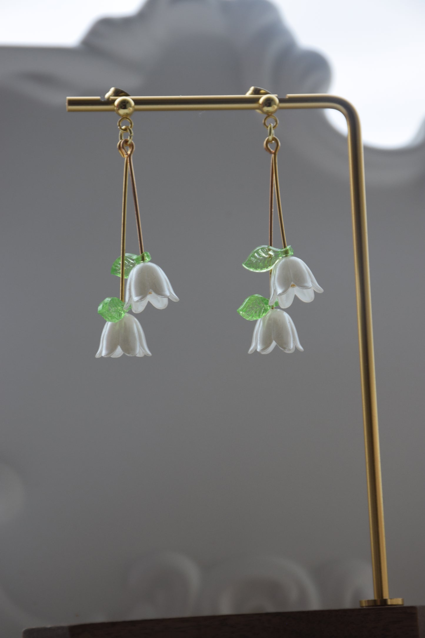 White dangle earring