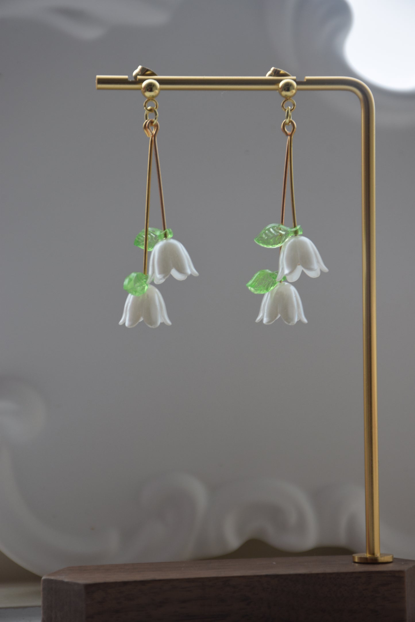 White dangle earring