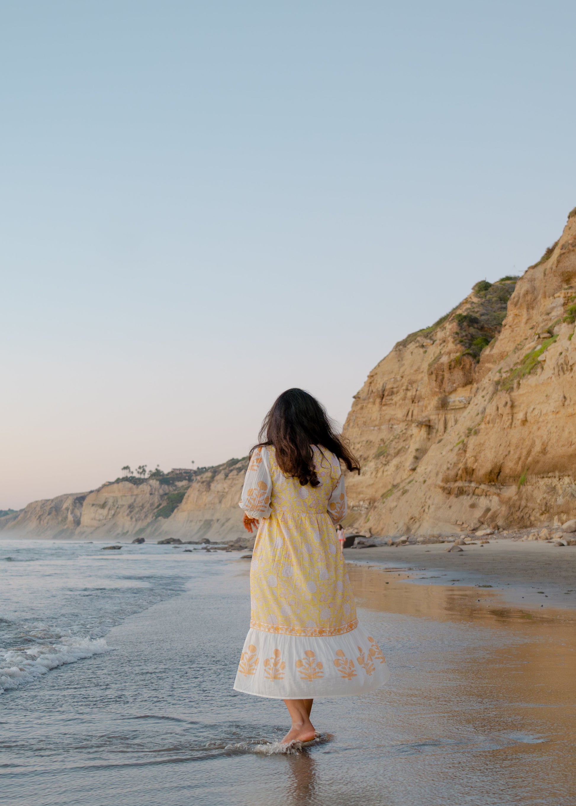 Yellow hand block printed cotton dress with sheer sleeves and floral pattern, sustainable boho vacation wear by Moksha Looms