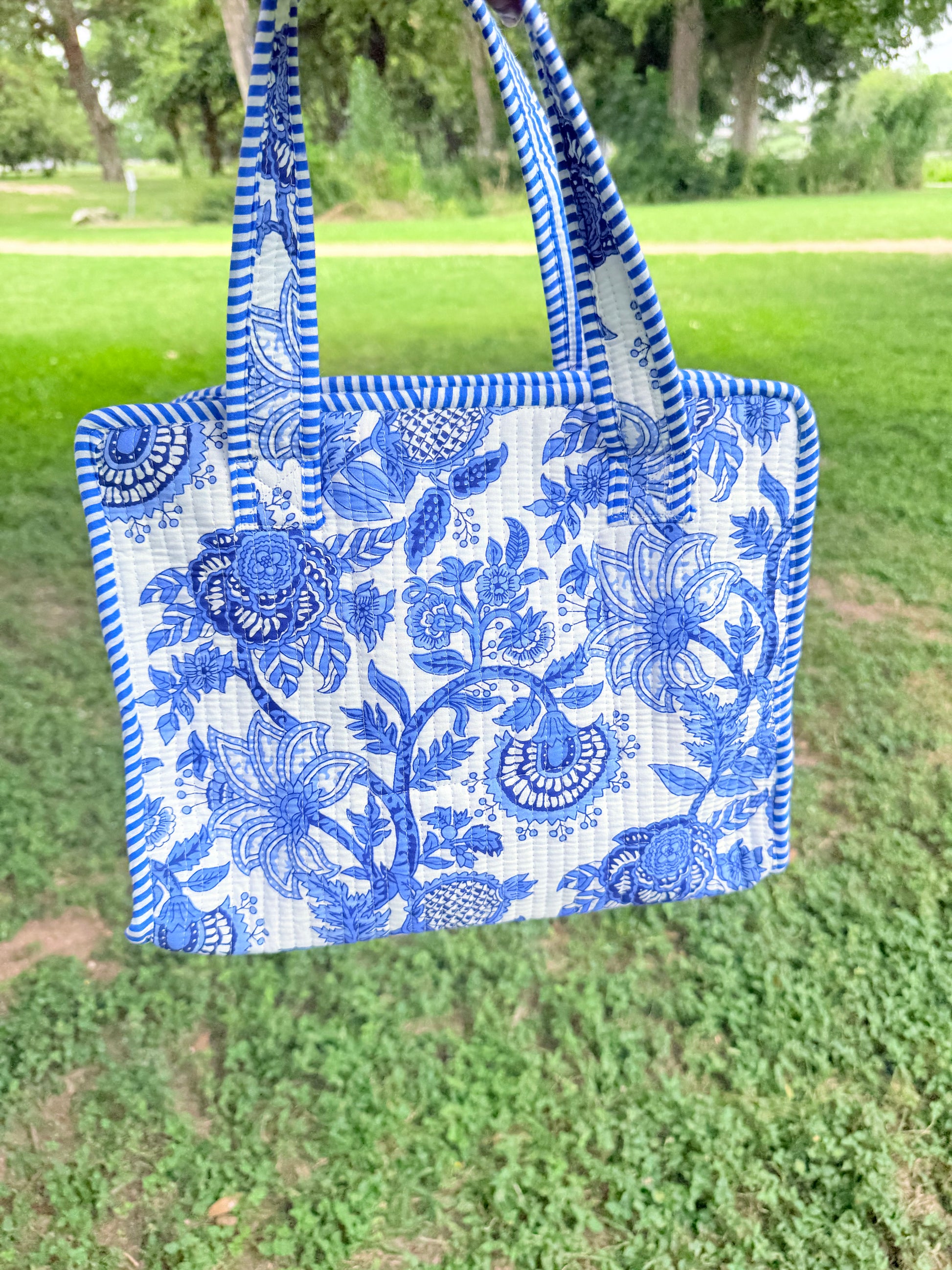 Blue floral hand block printed cotton mini tote bag with zipper and tassel