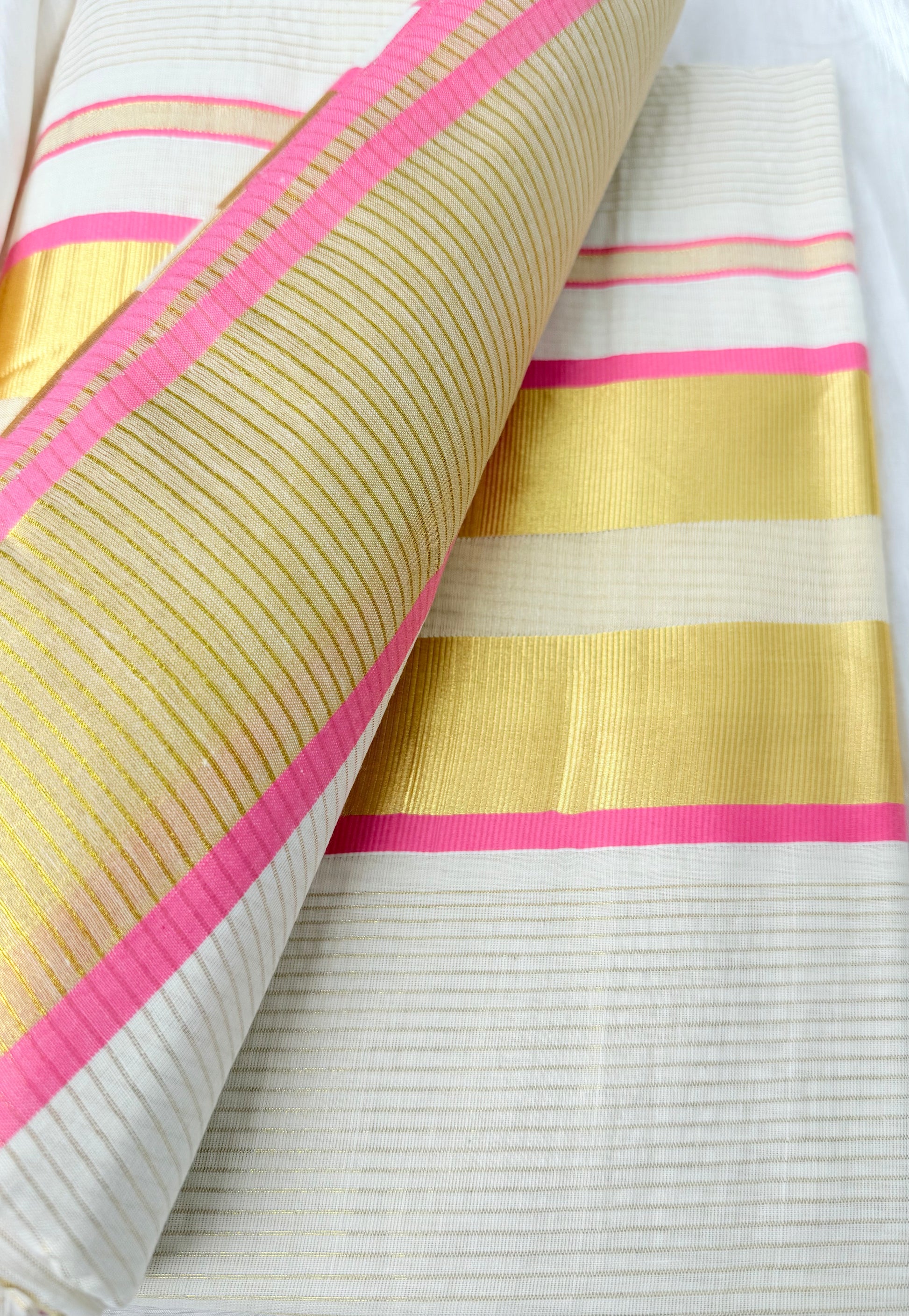 Traditional Kerala saree with pink border


