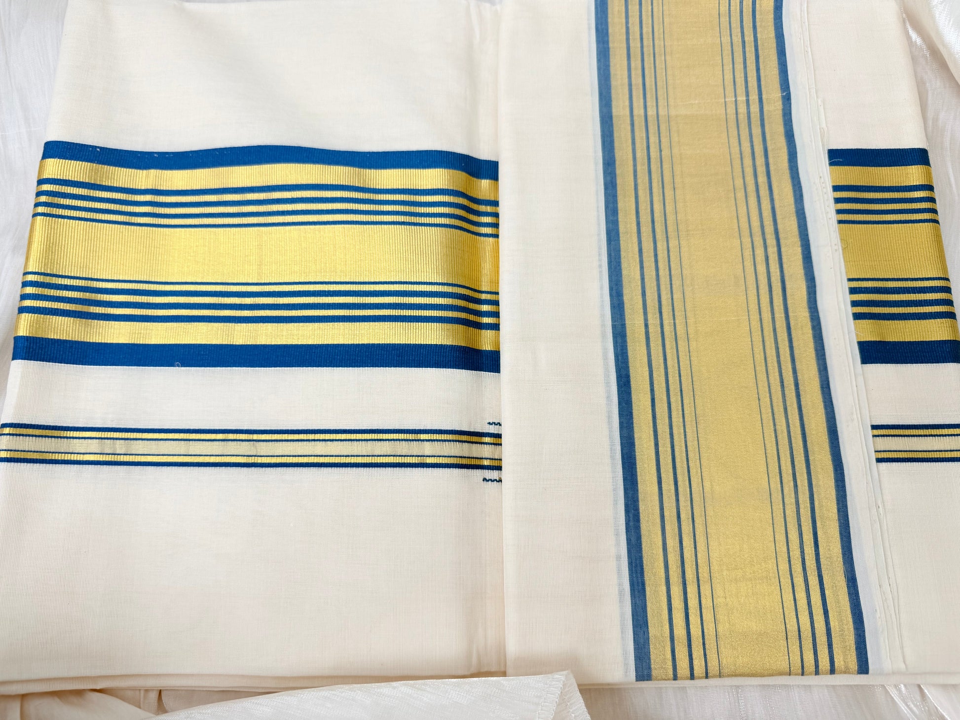 Embrace the spirit of Onam with this authentic handloom Kerala Kasavu saree. Woven with precision, it features the classic cream base and rich golden border that symbolize Kerala’s rich cultural heritage. Handloom kerala kasavu saree