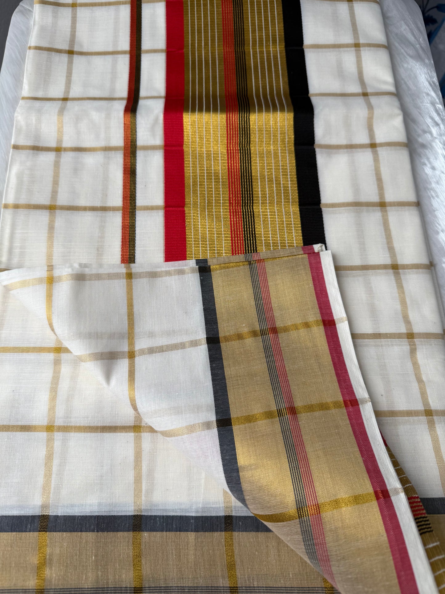 Kerala saree red black checked pattern