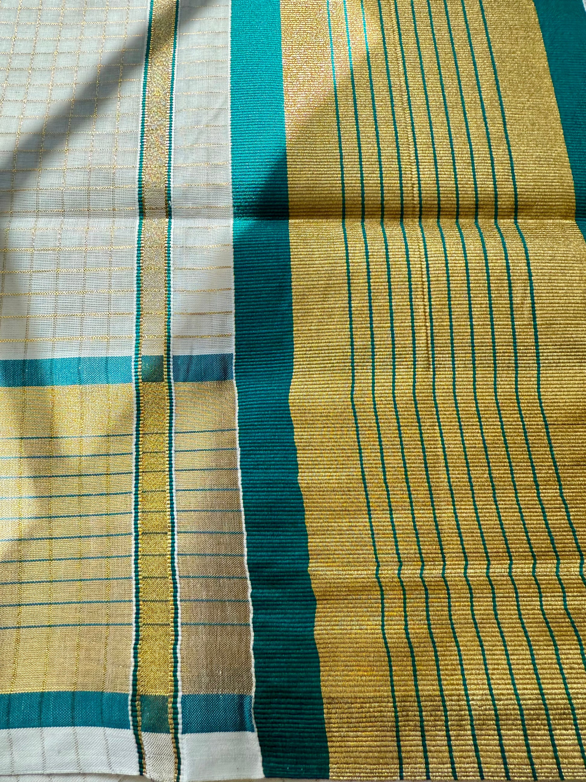 Kerala kasavu microcheck saree


