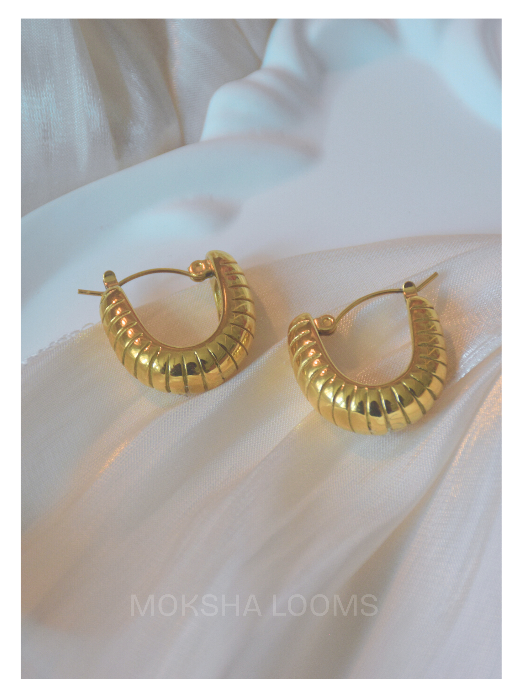 These gold plated earrings are perfect for everyday wear. With their hypoallergenic material, they are suitable for those with sensitive skin. Plus, they are water resistant, making them durable and long-lasting. Gold plated earring

 