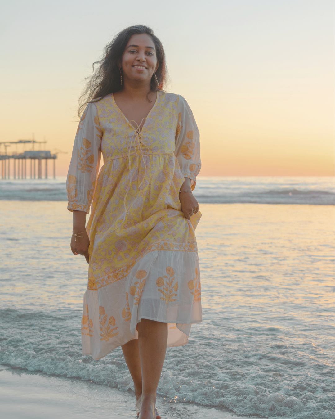 Yellow hand block printed cotton dress with sheer sleeves and floral pattern, sustainable boho vacation wear by Moksha Looms