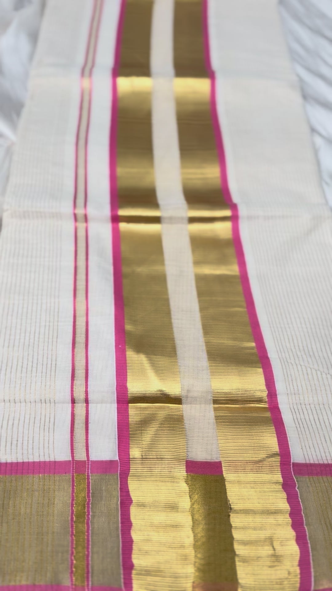 Traditional Kerala saree with pink border


