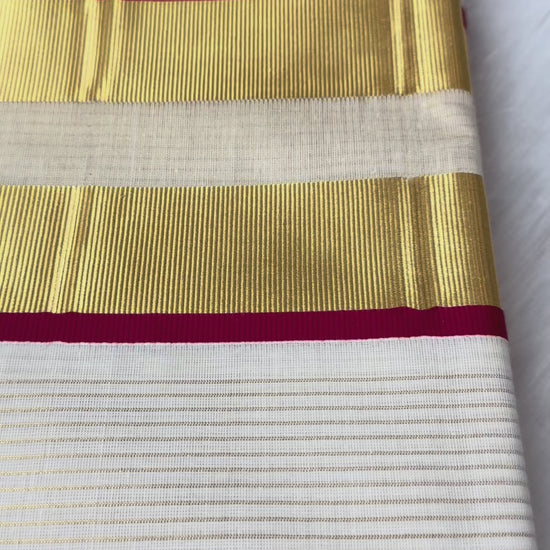 This Kerala Onam saree showcases traditional kasavu craftsmanship with striking red accents, reflecting the cultural essence of Kerala’s Onam festival. 